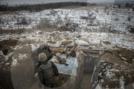 Pro-government forces fight in Ukraine 