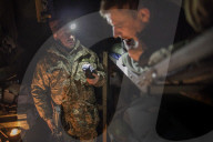 Pro-government forces fight in Ukraine 