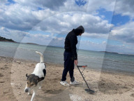 Beachcombing with metal detector on Athens beaches