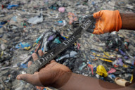 'Dead white person's clothes' mount up as Ghana's Kantamanto market struggles to rebuild after fire.