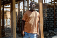 'Dead white person's clothes' mount up as Ghana's Kantamanto market struggles to rebuild after fire.