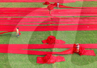Red cloth laid out by Sabina Akter