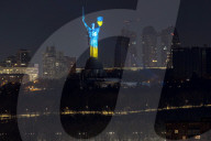 Motherland Monument shines in Ukraine's national colours