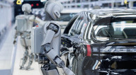 Humanoid robots show off teamwork in car plant takeover