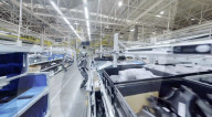 Humanoid robots show off teamwork in car plant takeover