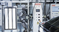 Humanoid robots show off teamwork in car plant takeover