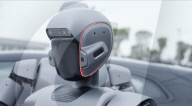 Humanoid robots show off teamwork in car plant takeover