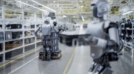 Humanoid robots show off teamwork in car plant takeover