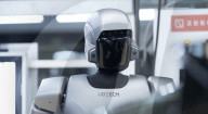 Humanoid robots show off teamwork in car plant takeover