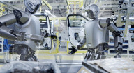 Humanoid robots show off teamwork in car plant takeover
