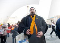 Orange balloons are released over Trafalgar Square in memory & honour of the Bibas family, London, UK.