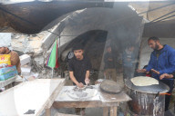 Gazans shopping among the rubble in Jabalia Refugee Camp
