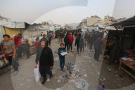 Gazans shopping among the rubble in Jabalia Refugee Camp