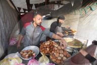 Gazans shopping among the rubble in Jabalia Refugee Camp
