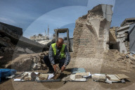 Gaza rescue team recovers manuscripts and antiquities from rubble