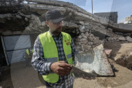 Gaza rescue team recovers manuscripts and antiquities from rubble