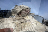 Gaza rescue team recovers manuscripts and antiquities from rubble