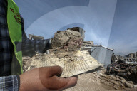 Gaza rescue team recovers manuscripts and antiquities from rubble