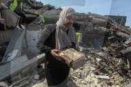 Gaza rescue team recovers manuscripts and antiquities from rubble