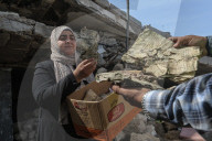 Gaza rescue team recovers manuscripts and antiquities from rubble