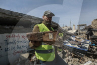 Gaza rescue team recovers manuscripts and antiquities from rubble