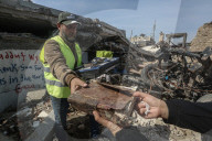 Gaza rescue team recovers manuscripts and antiquities from rubble