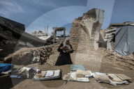 Gaza rescue team recovers manuscripts and antiquities from rubble