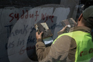 Gaza rescue team recovers manuscripts and antiquities from rubble