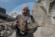 Gaza rescue team recovers manuscripts and antiquities from rubble