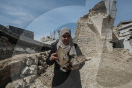 Gaza rescue team recovers manuscripts and antiquities from rubble