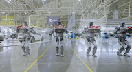Robots deliver women's day roses to car plant workers