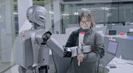 Robots deliver women's day roses to car plant workers