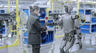 Robots deliver women's day roses to car plant workers