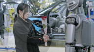 Robots deliver women's day roses to car plant workers