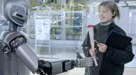 Robots deliver women's day roses to car plant workers