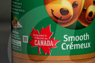 Consumer Grocery Products With Various Labels Showing Country Of Origin.