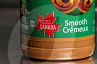 Consumer Grocery Products With Various Labels Showing Country Of Origin.