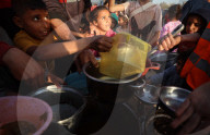 Palestinian Children Receive Iftar Meal at Gaza City Distribution Point During Ramadan