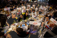 Hostage families hold Shabbat dinner facing army headquarters