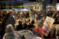 Hostage families hold Shabbat dinner facing army headquarters