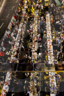 Hostage families hold Shabbat dinner facing army headquarters