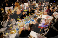 Hostage families hold Shabbat dinner facing army headquarters