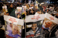 Hostage families hold Shabbat dinner facing army headquarters
