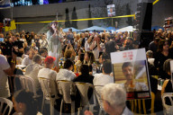 Hostage families hold Shabbat dinner facing army headquarters