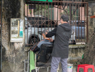 Traditional Street Barber In Vietnam