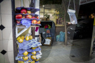 In The City Of Buenos Aires, Argentina, More And More People Are Looking For Food In Garbage Containers.
