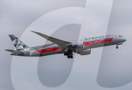 Etihad Boeing 787 Abu Dhabi Grand Prix 2025 livery taking off from Barcelona