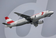 Austrian Airlines Retro Livery Airbus A320 taking off from Barcelona