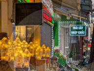 Illuminated Shopfronts And Decorative Lamps In Vietnam