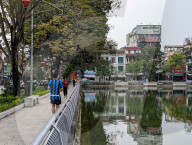 Tranquil Walk Along The River In The Vietnamese Town Of Thanh Hoa